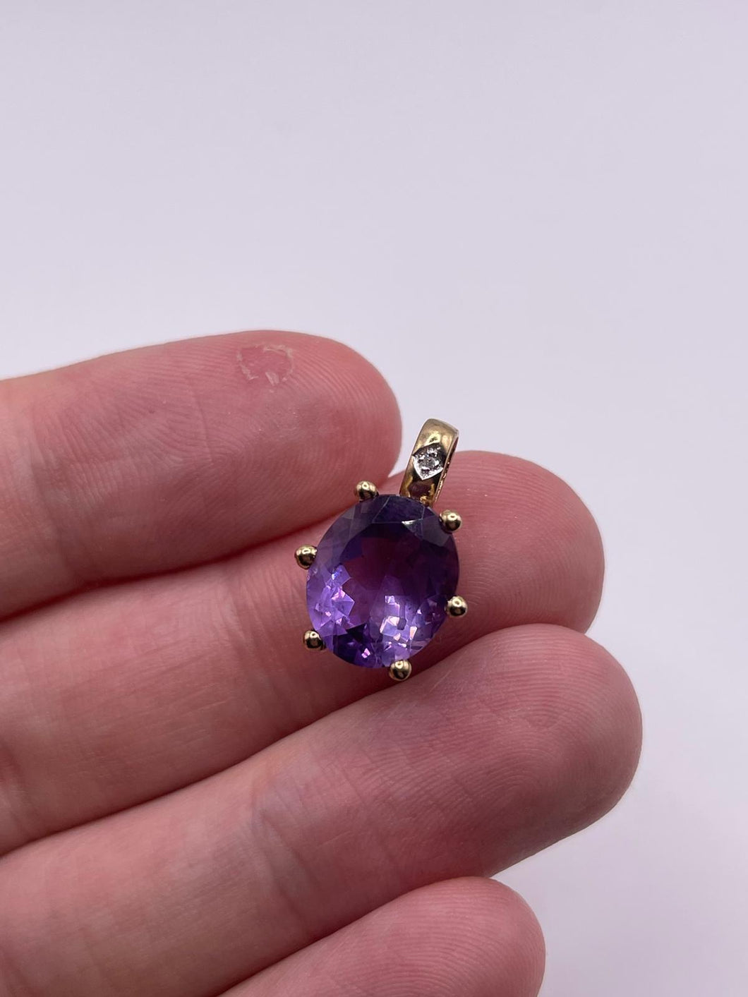 9ct gold amethyst and diamond pendant