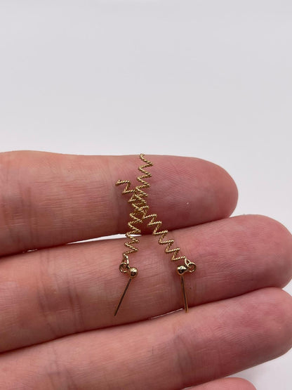 9ct gold spirel earrings