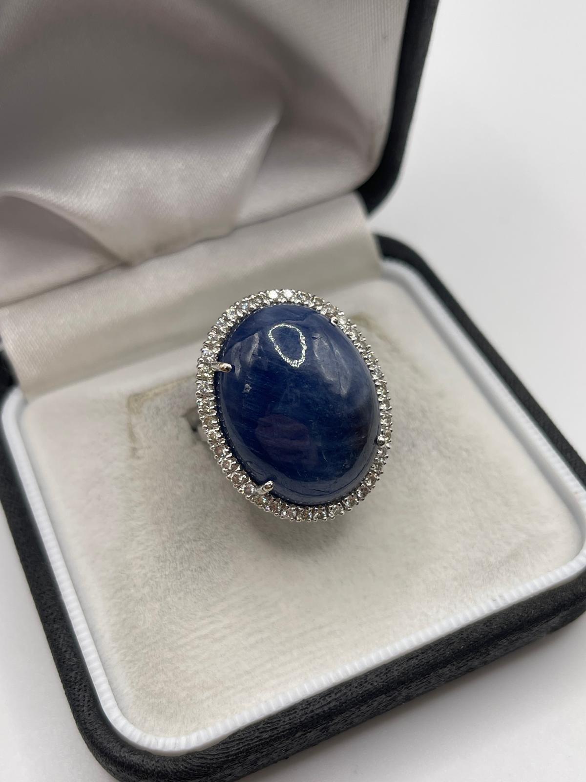 18ct white gold cabachon sapphire and diamond ring
